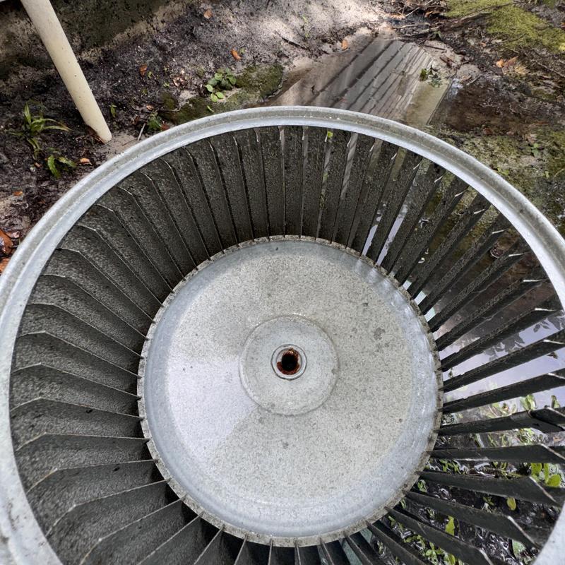 Blower motor wheel from heat pump system outdoors