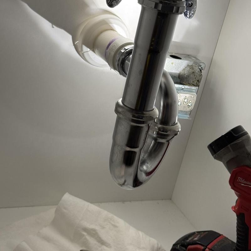 Lavatory sink drain trap installation under cabinet Lavatory sink drain trap installation under cabinet