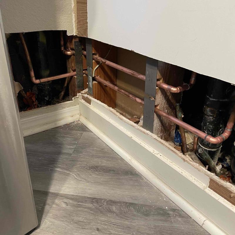Type L copper water line behind kitchen wall panel Type L copper water line behind kitchen wall panel