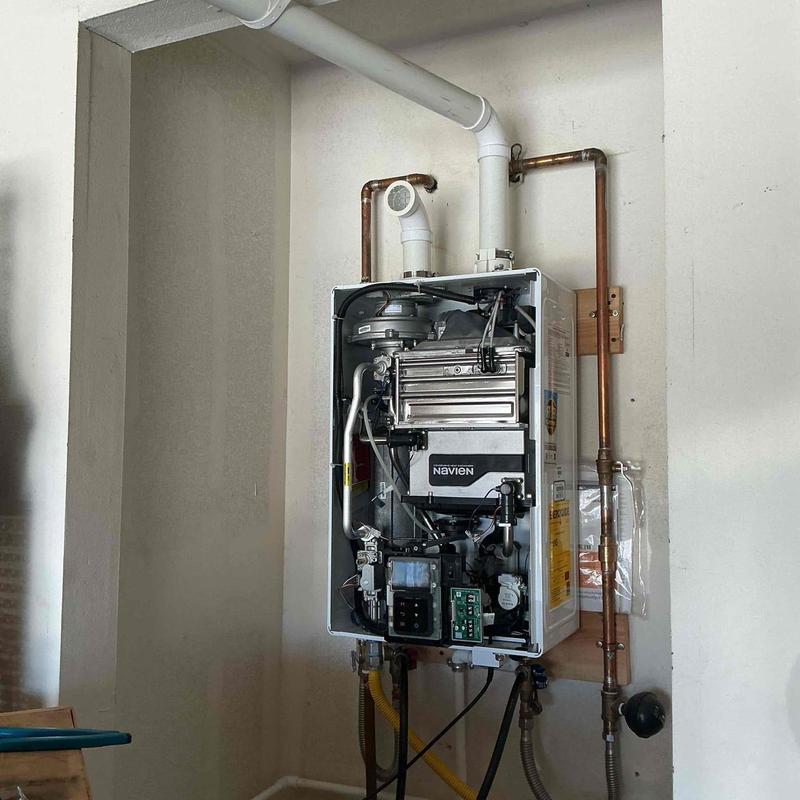 Tankless water heater flushing and internal cleaning Tankless water heater flushing and internal cleaning