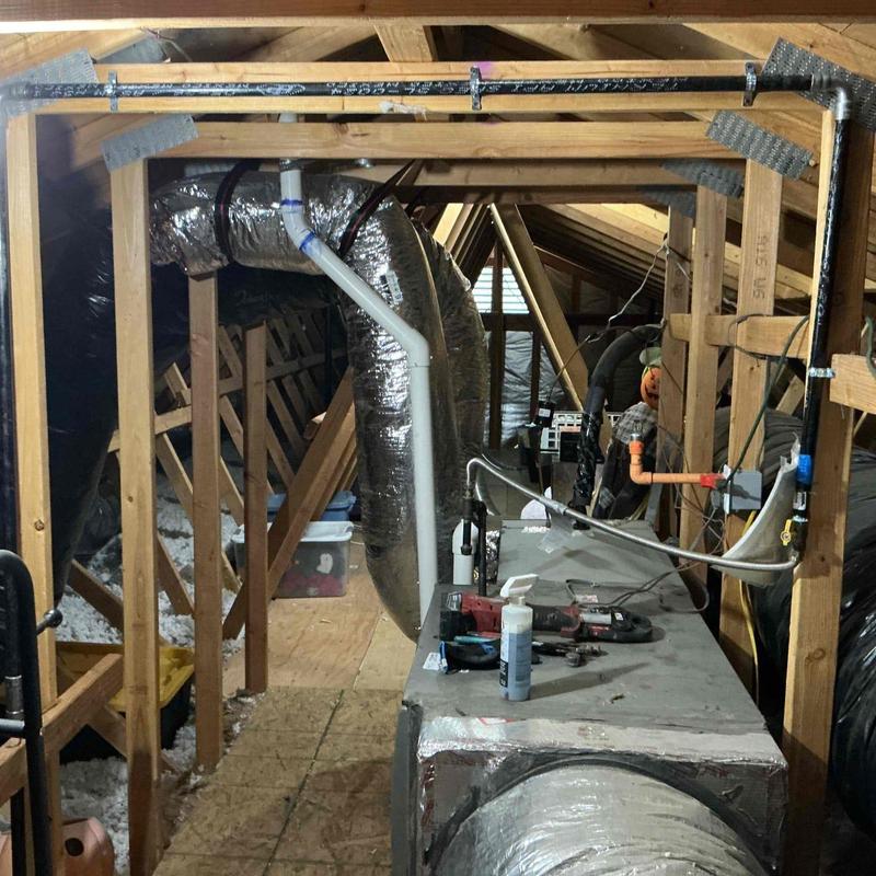 Galvanized pipe extended and secured in attic space Galvanized pipe extended and secured in attic space