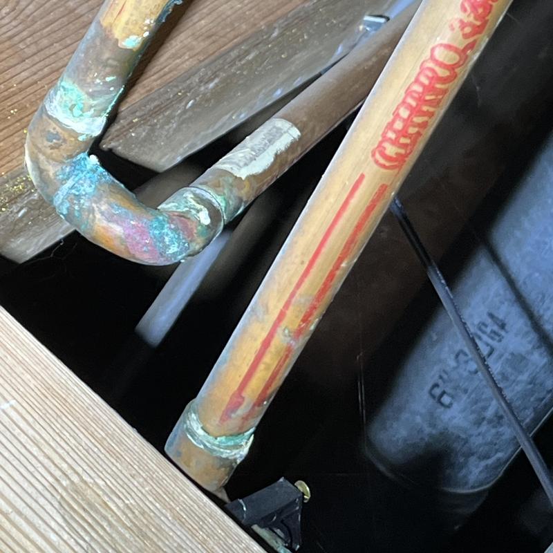 Copper water pipe with corrosion and soldered joint Copper water pipe with corrosion and soldered joint