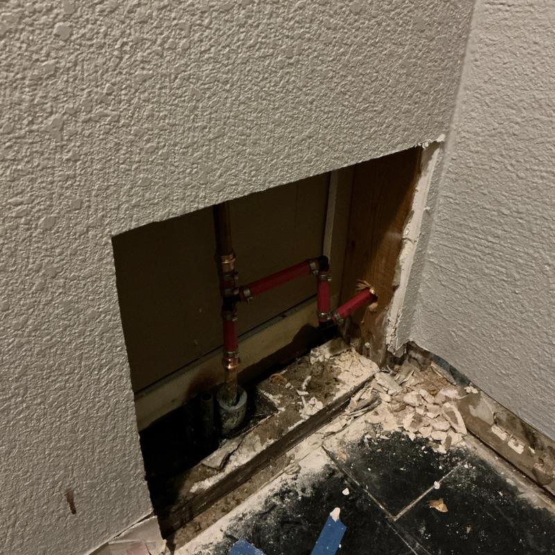 PEX hot water line with shut off valve in wall cavity