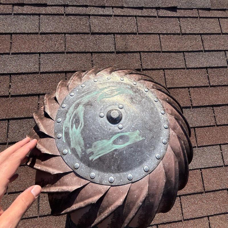 Roof turbine vent with weathered metal and shingles