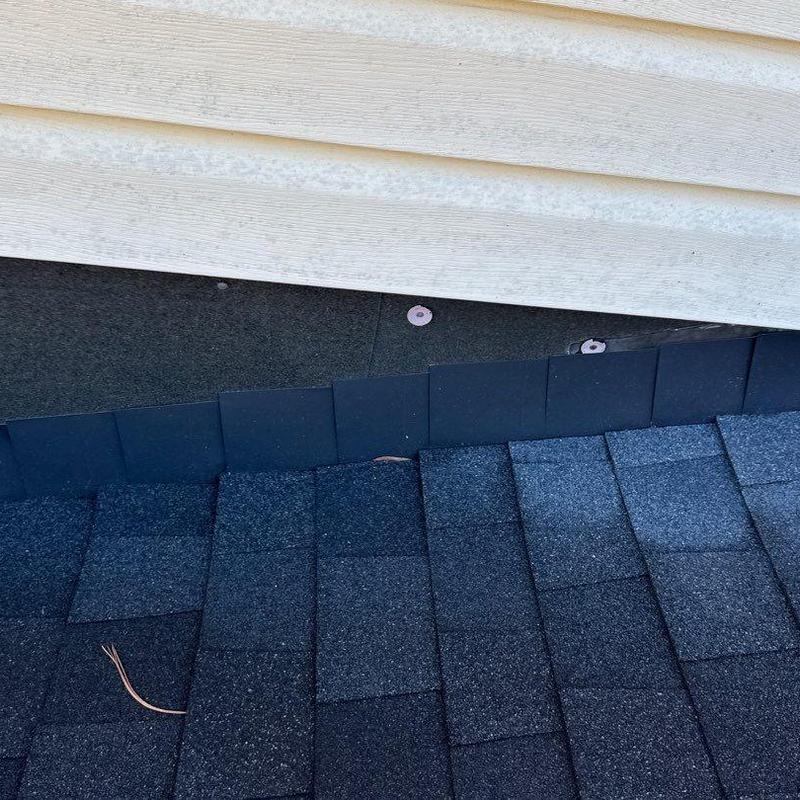Roof shingles and flashing under siding in Brentwood, TN