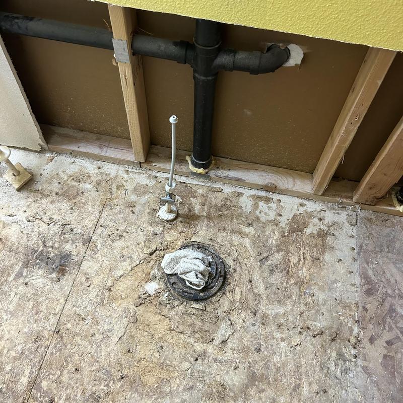 Bathroom floor drain and water supply line exposed for repair estimate Bathroom floor drain and water supply line exposed for repair estimate