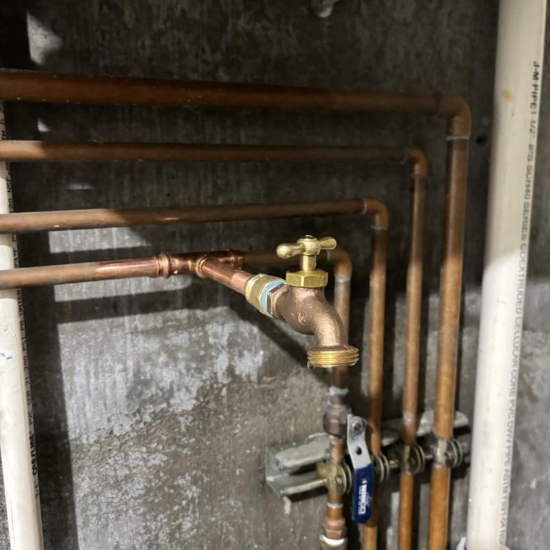 Hose bib installation on copper piping in equipment room