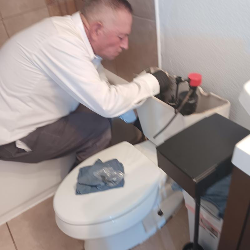 Toilet tank leak inspection and repair in bathroom Toilet tank leak inspection and repair in bathroom