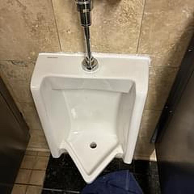 Urinal drain and spud replacement with reset Urinal drain and spud replacement with reset