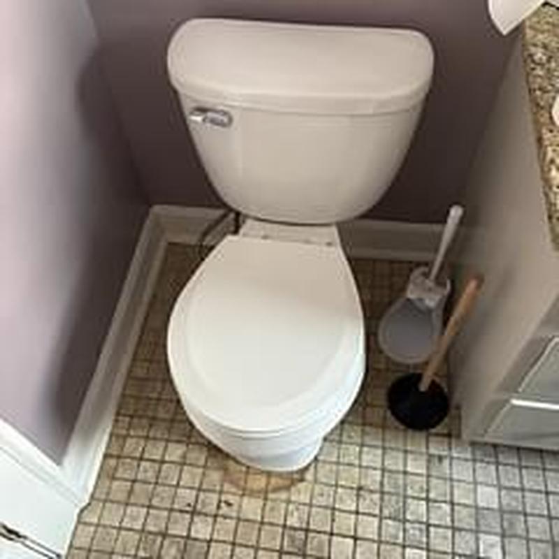 Mansfield round bowl toilet installation in bathroom corner
