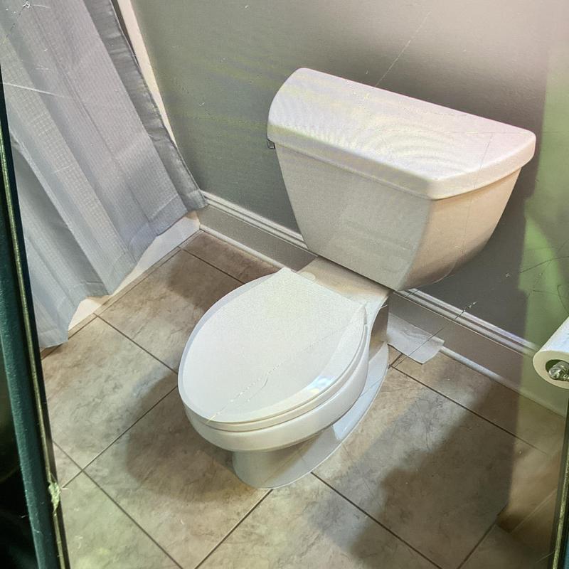 Toilet installation with new supply line and caulk seal