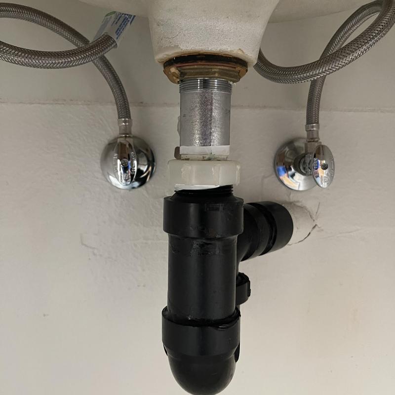 Sink drain trap and supply lines with angle stops Sink drain trap and supply lines with angle stops