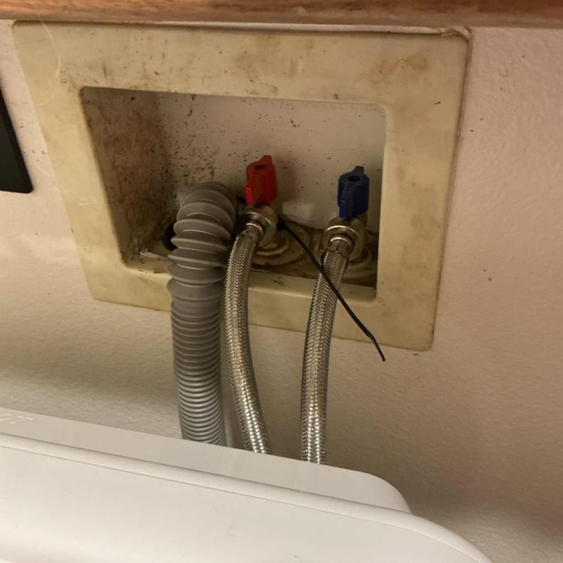 Laundry valve connections with caulked box Laundry valve connections with caulked box