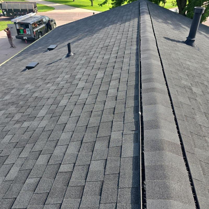 Tamko Stormfighter Flex shingles on roof ridge Tamko Stormfighter Flex shingles on roof ridge