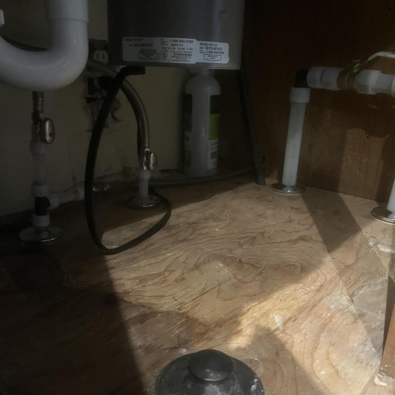 Water heater installation with PEX piping below sink