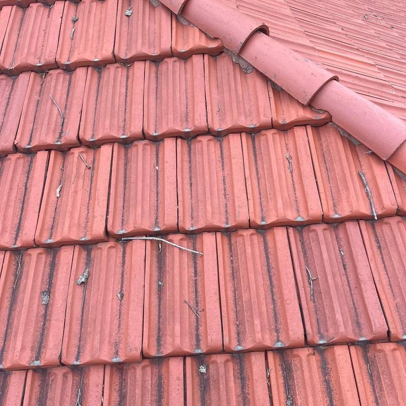 French clay roof tiles with ridge tile installation French clay roof tiles with ridge tile installation