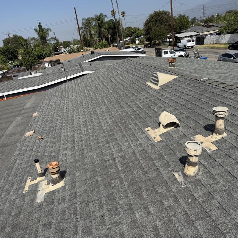 Shingle roof with vent pipes and patches in Covina, CA Shingle roof with vent pipes and patches in Covina, CA
