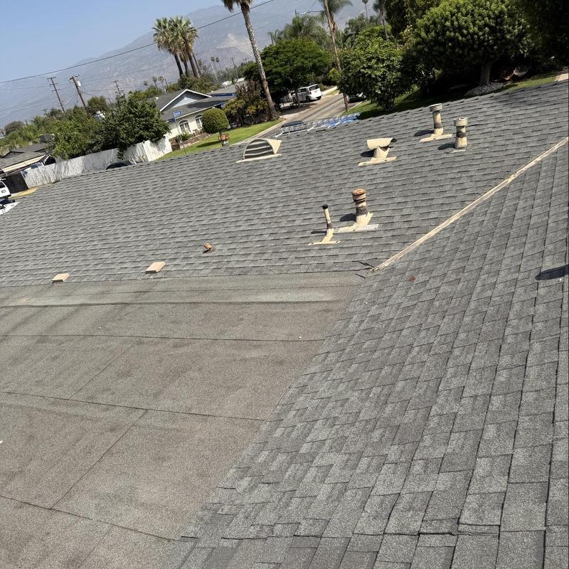 Shingle roof with vent pipes and flashing details Shingle roof with vent pipes and flashing details