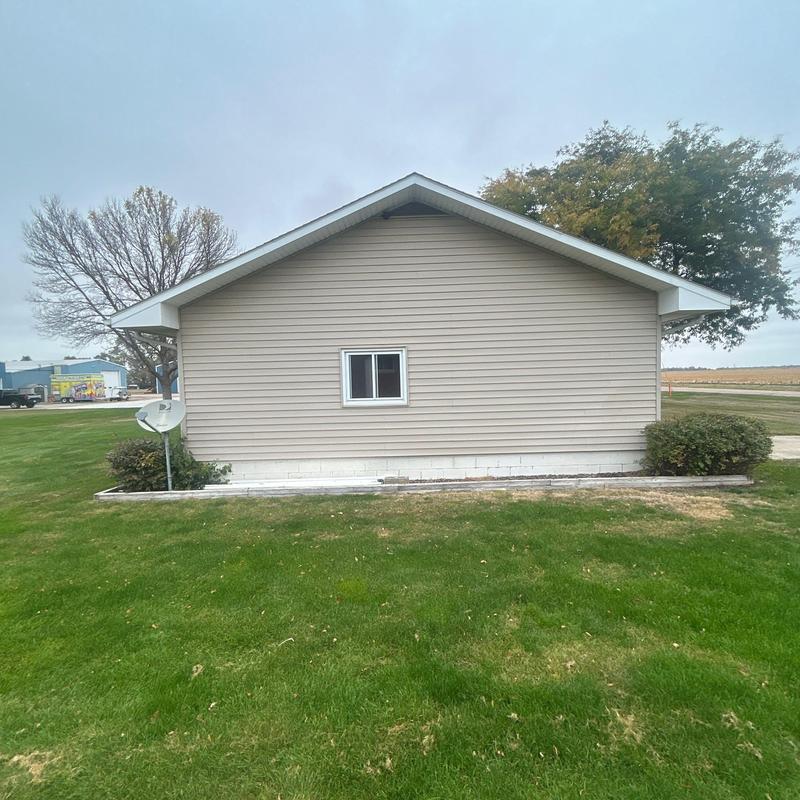 Vinyl siding installation on house exterior wall Vinyl siding installation on house exterior wall