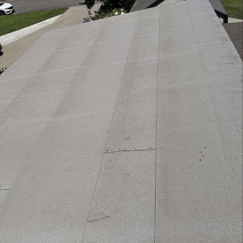 Flat roof membrane with minor surface wear Flat roof membrane with minor surface wear