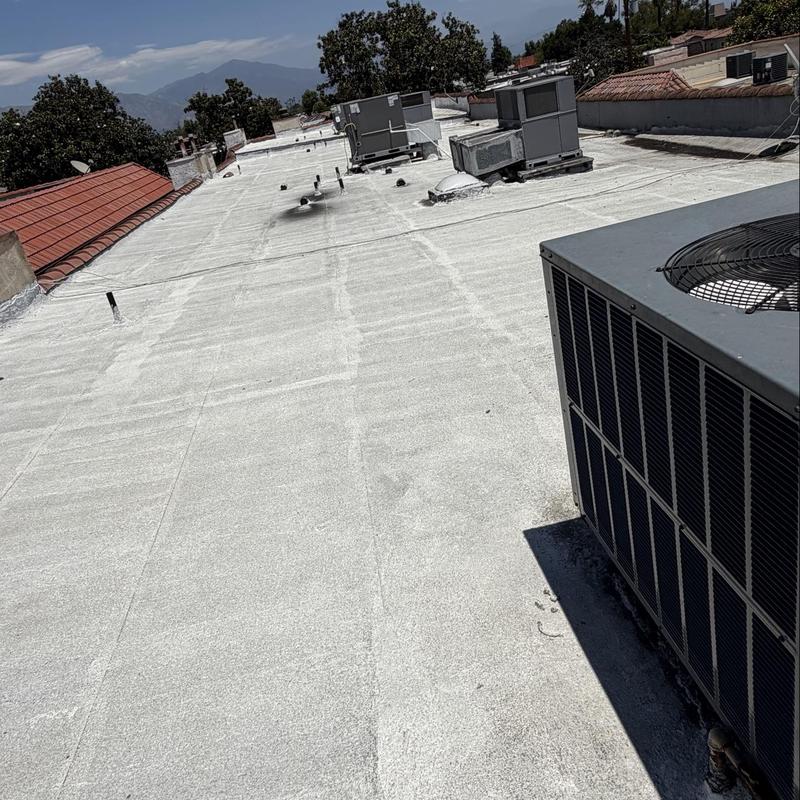 Flat roof torch down membrane inspection with HVAC units Flat roof torch down membrane inspection with HVAC units
