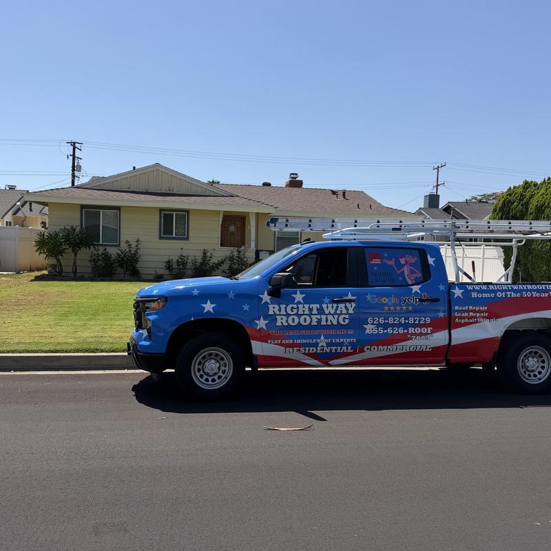 Shingle roof inspection truck parked on street Shingle roof inspection truck parked on street
