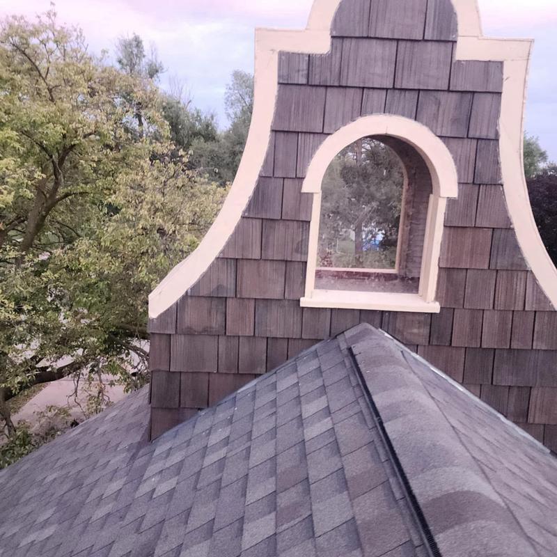 Brava Composite Cedar Shake siding on tower wall Brava Composite Cedar Shake siding on tower wall
