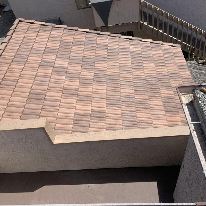 Tile roofing installation on residential flat roof Tile roofing installation on residential flat roof