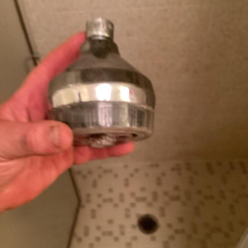 Shower head replacement for leak repair in shower Shower head replacement for leak repair in shower
