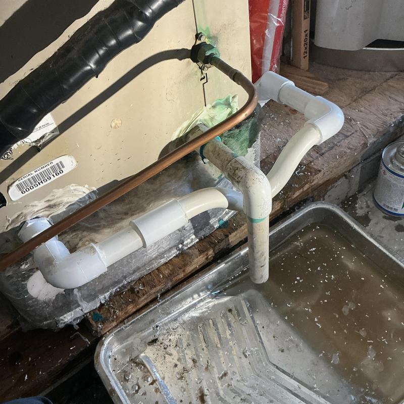 Furnace condensate drain pipe with PVC fittings