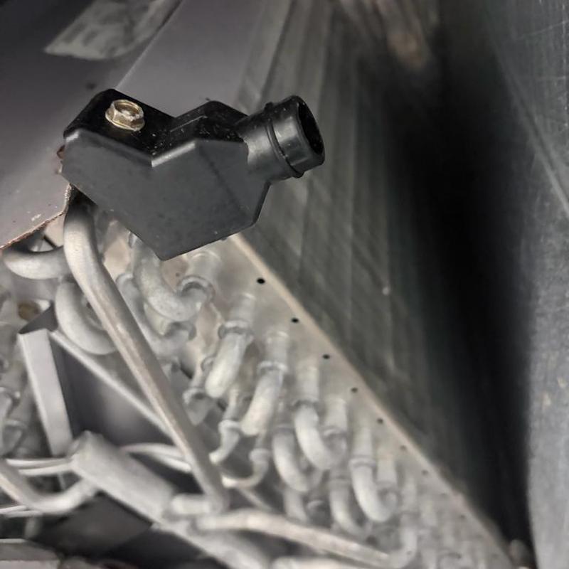 Evaporator coil condensate float switch in AC unit Evaporator coil condensate float switch in AC unit
