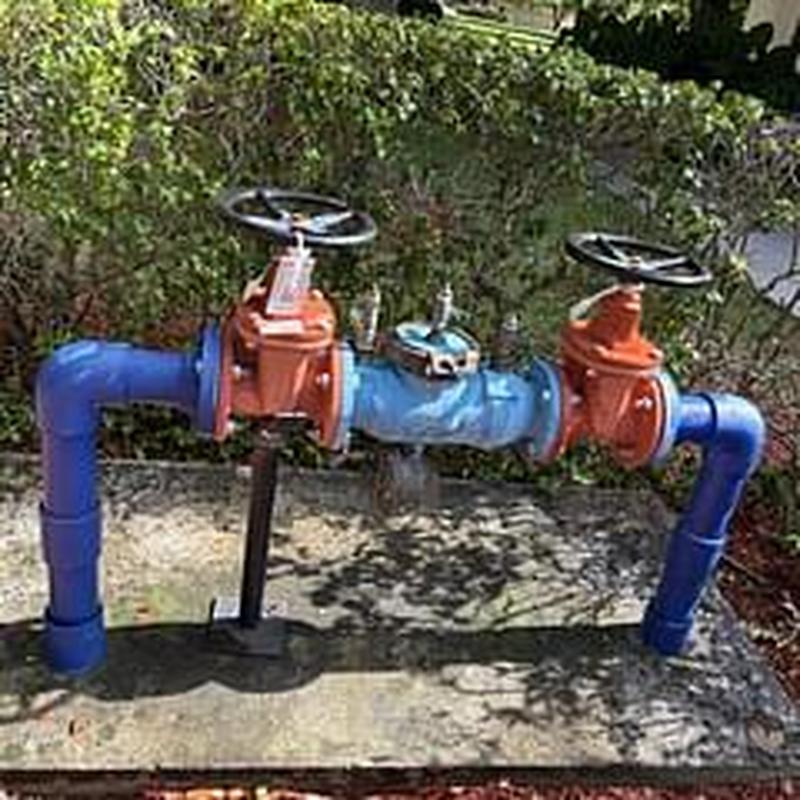 Wilkins 375 backflow preventer with valves outdoors Wilkins 375 backflow preventer with valves outdoors