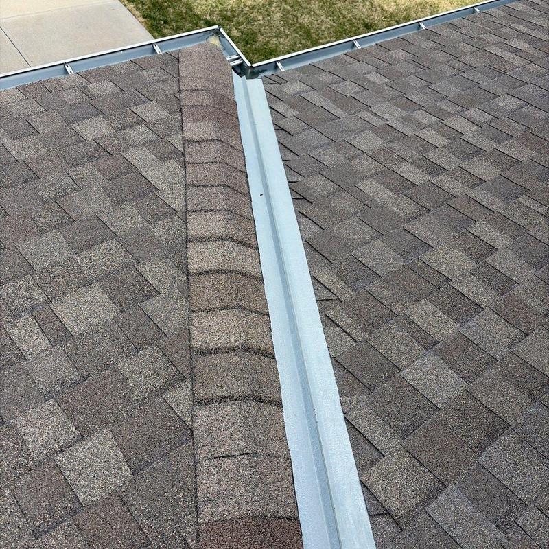 Tamko Titan XT Class 3 Impact Resistant shingles on roof valley Tamko Titan XT Class 3 Impact Resistant shingles on roof valley