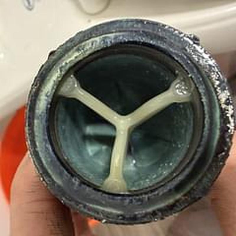 Sloan flush valve vacuum breaker with wear buildup Sloan flush valve vacuum breaker with wear buildup