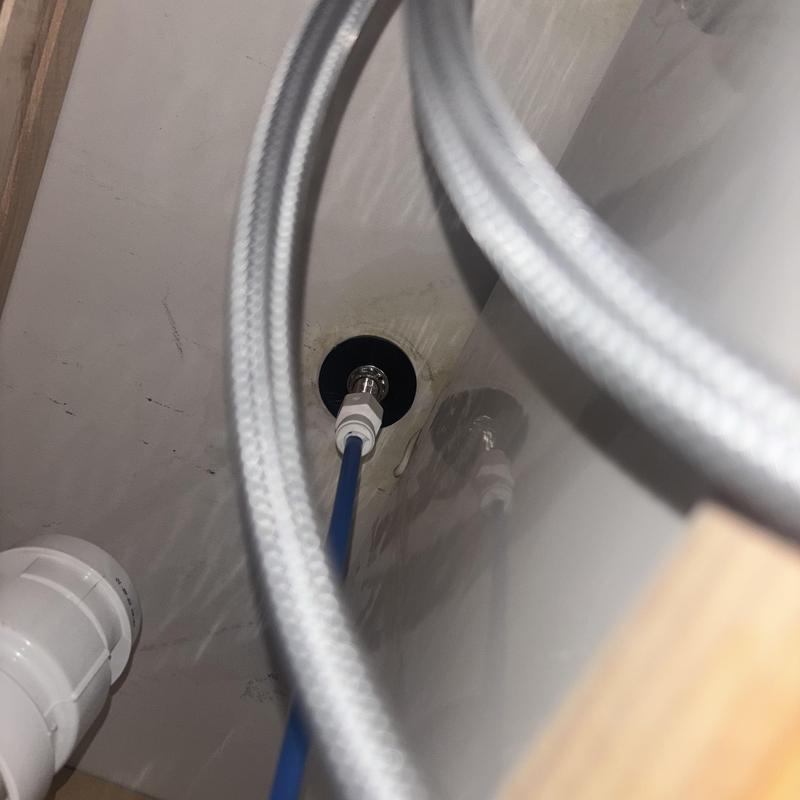 RO system water line connection under sink with hoses RO system water line connection under sink with hoses