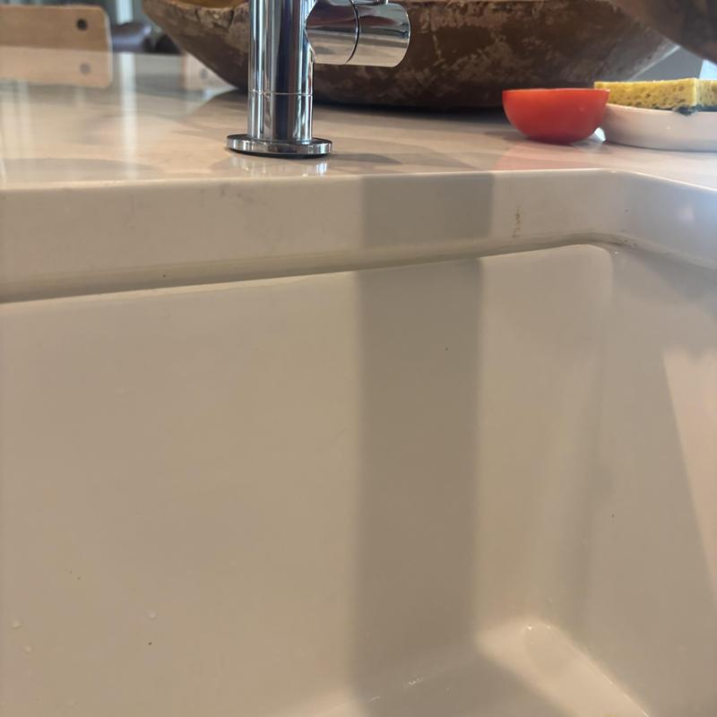 RO faucet base and countertop tightening in kitchen sink RO faucet base and countertop tightening in kitchen sink