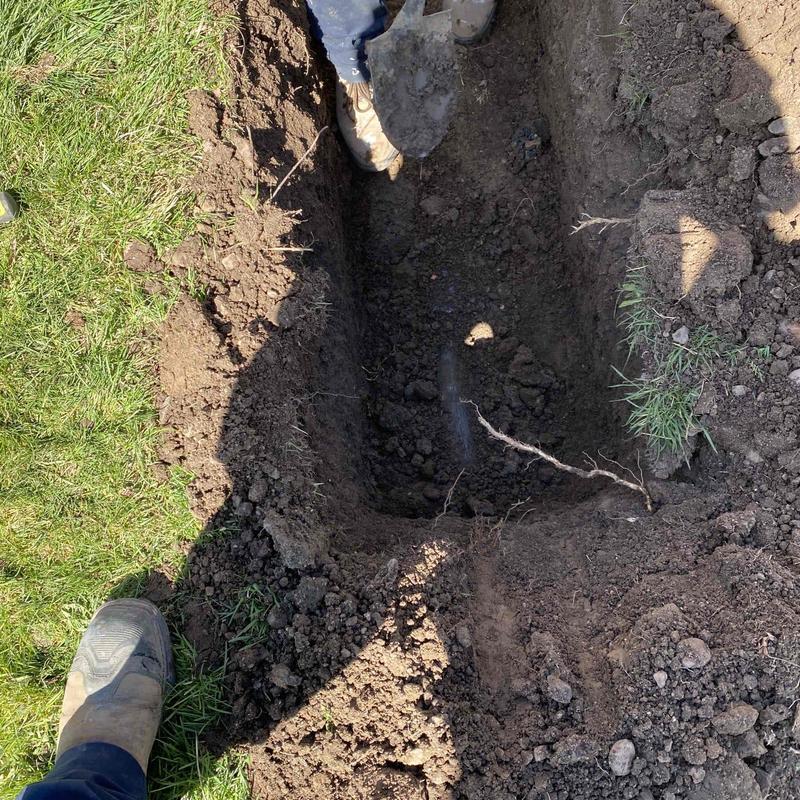 Sewer line trench excavation near septic tank Sewer line trench excavation near septic tank