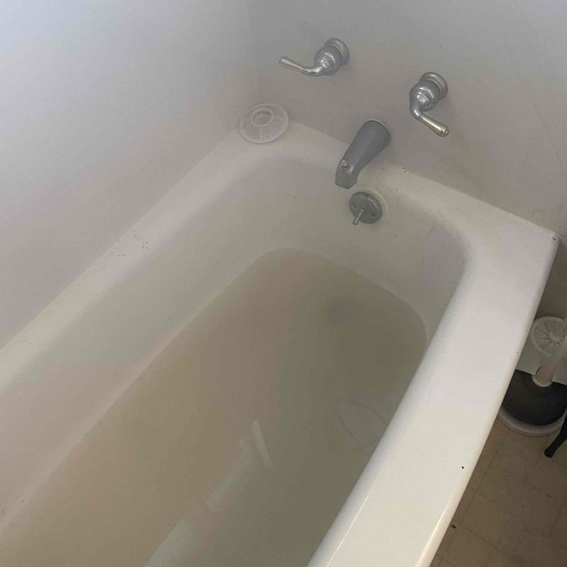 Bathtub drain clogged with standing water Bathtub drain clogged with standing water