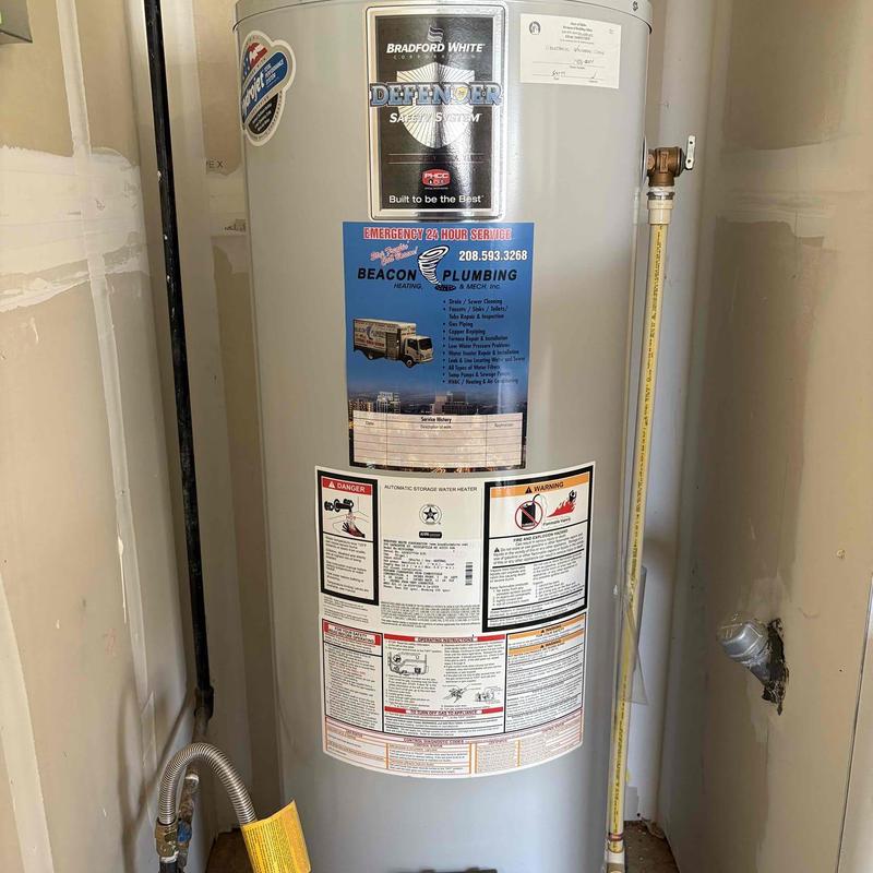 Water heater installation in residential utility room Water heater installation in residential utility room