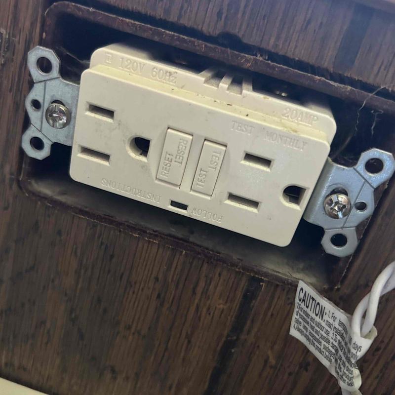 GFCI electrical outlet installation in wood paneling GFCI electrical outlet installation in wood paneling