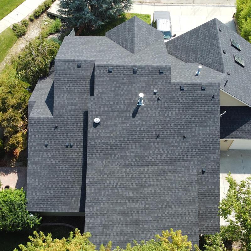 IKO Dynasty granite black shingle roof installation overhead IKO Dynasty granite black shingle roof installation overhead