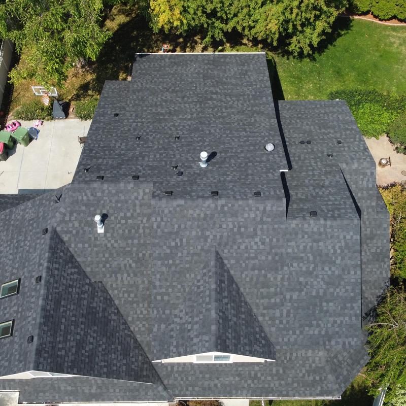 IKO Dynasty granite black shingle roof replacement top view IKO Dynasty granite black shingle roof replacement top view