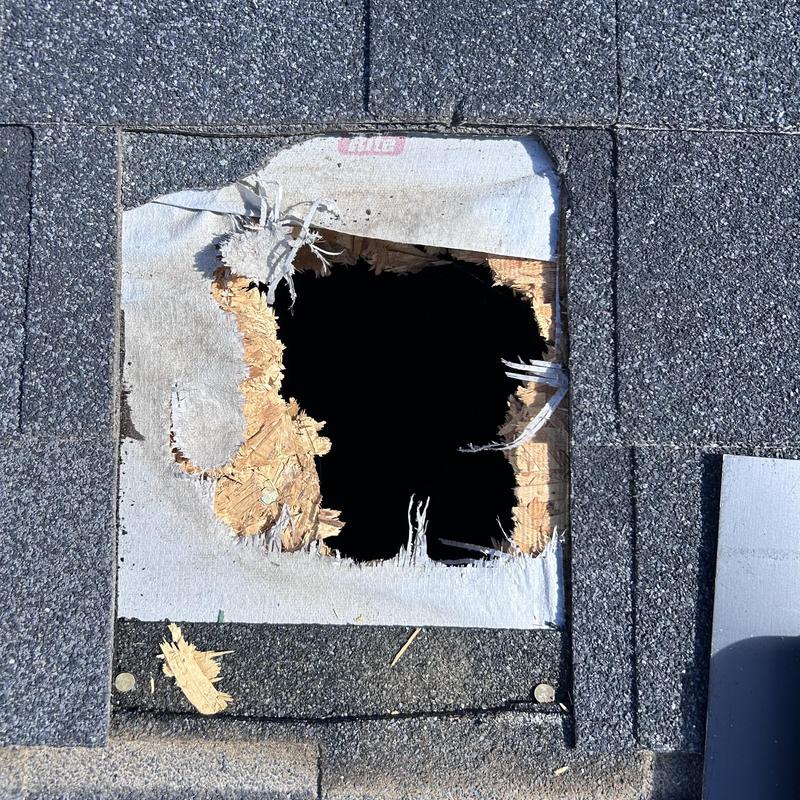 Roof vent hole with torn underlayment and damaged wood Roof vent hole with torn underlayment and damaged wood