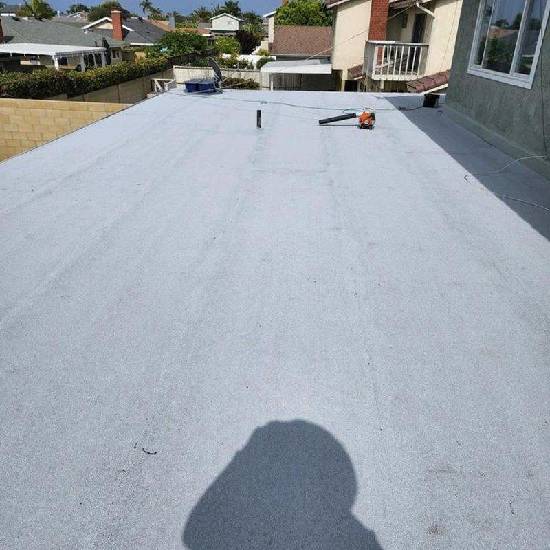Flat roof membrane installation on Costa Mesa home Flat roof membrane installation on Costa Mesa home