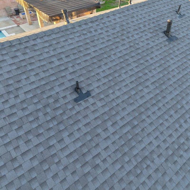 Shingle roof with vent pipe flashing installation Shingle roof with vent pipe flashing installation