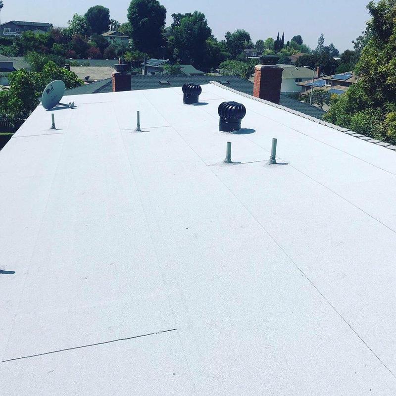 Flat roofing membrane with vents and satellite dish Flat roofing membrane with vents and satellite dish