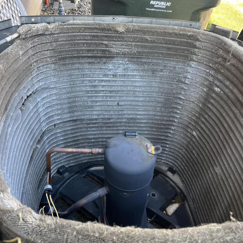 Condenser coil and compressor inside HVAC unit Condenser coil and compressor inside HVAC unit
