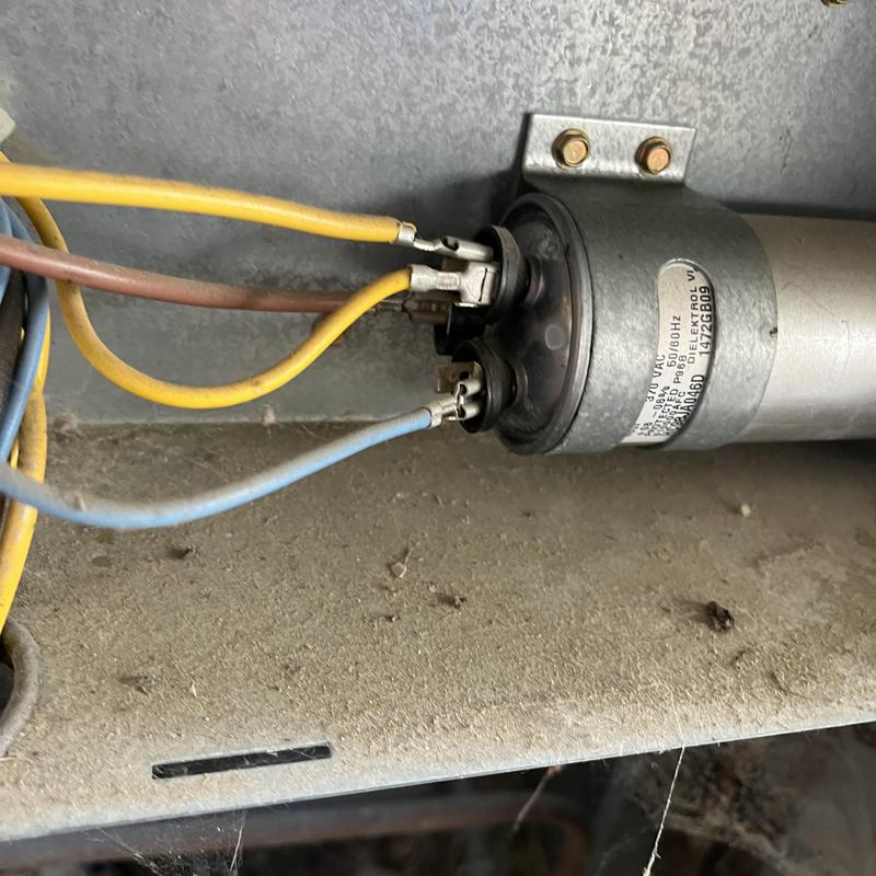 AC capacitor with wiring connections in HVAC unit AC capacitor with wiring connections in HVAC unit