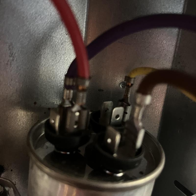 HVAC system start capacitor with connected wires HVAC system start capacitor with connected wires