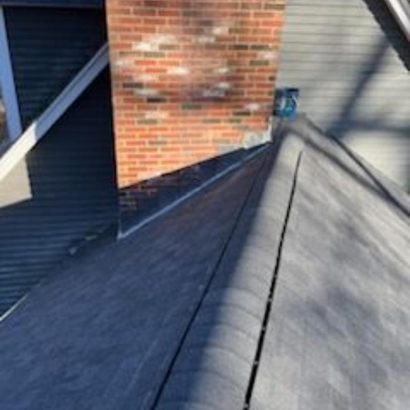 CertainTeed Landmark Pro 50-year shingle roof near chimney CertainTeed Landmark Pro 50-year shingle roof near chimney